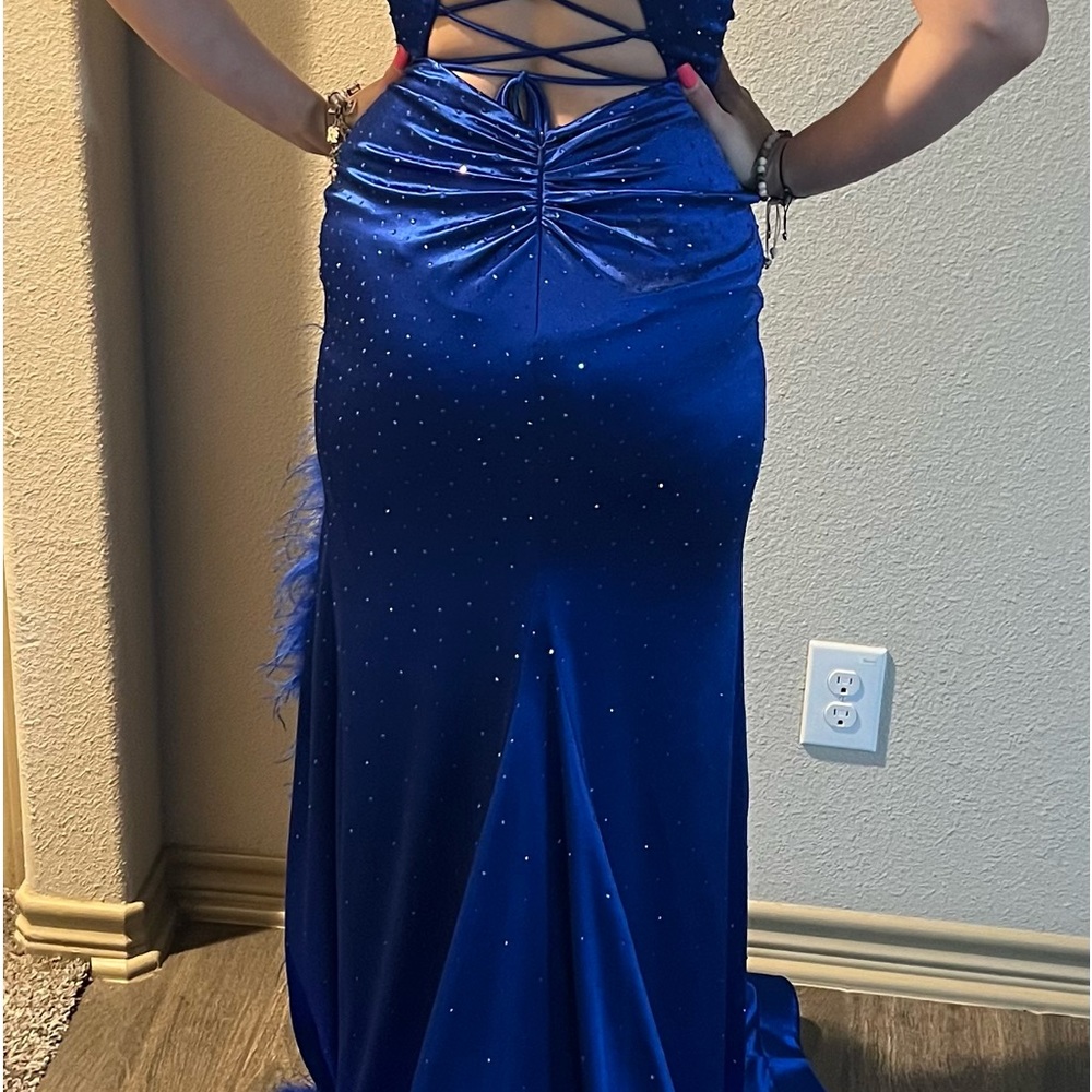 Beautiful vienna prom dress Royal blue with a little sparkle and feathers.